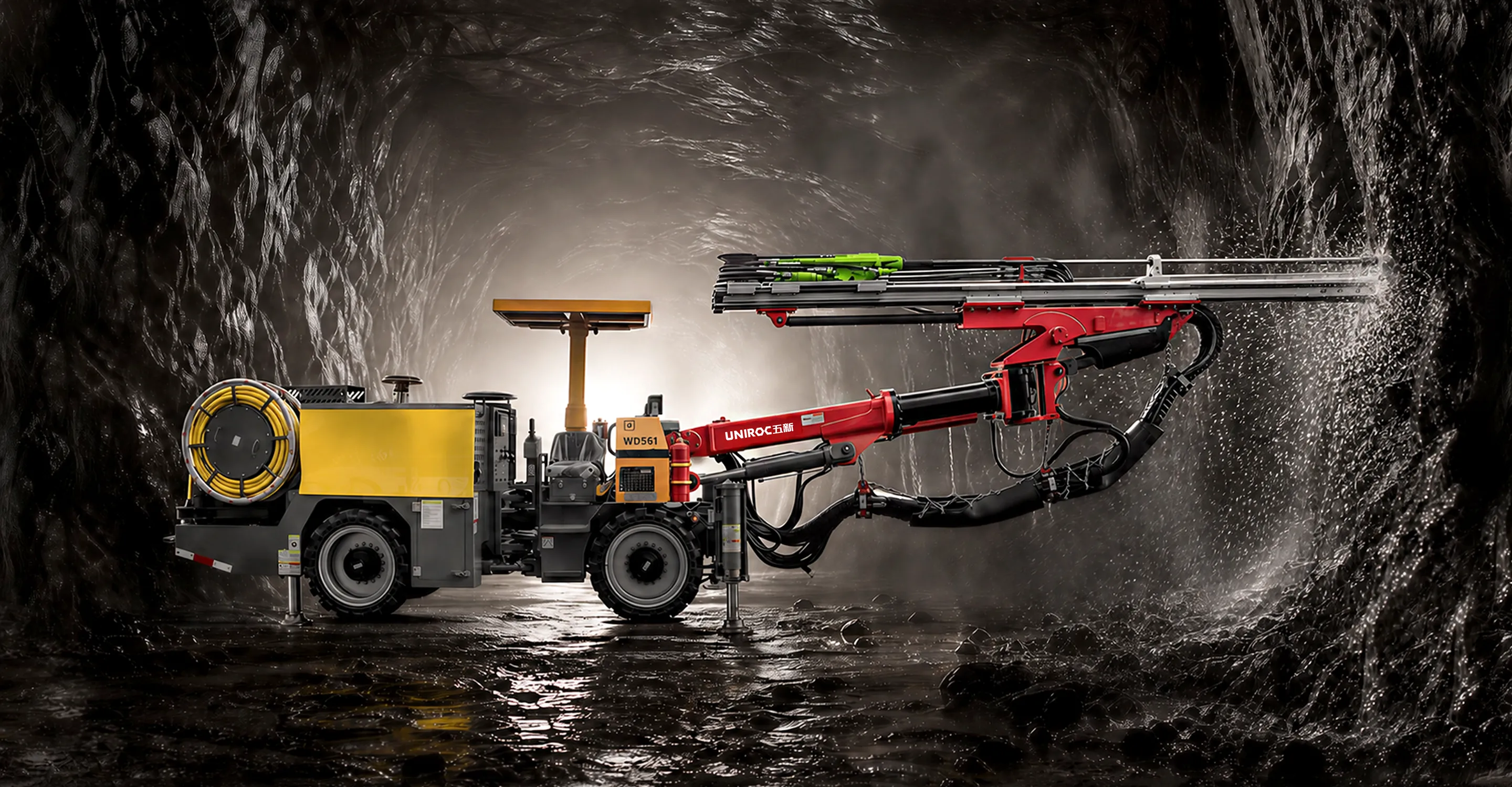 Underground mining drill operating at a rock face