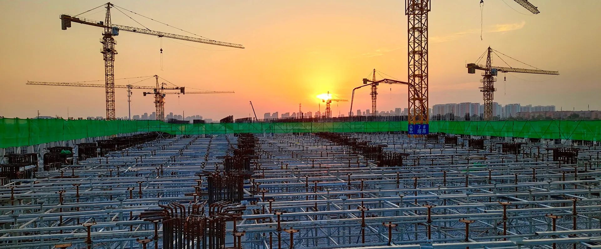 Container terminal with rows of red gantry cranes for inland ports